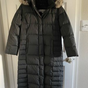 Eddie Bauer long hooded jacket with faux fur trim on hood. Excellent condition.